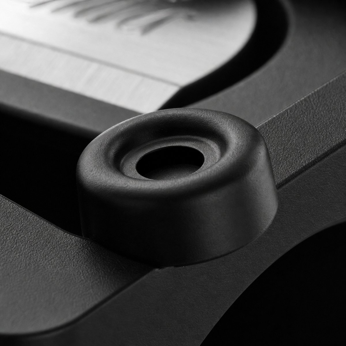 Macro spotlight of a KUM sharpener's integrated cleaning stick
